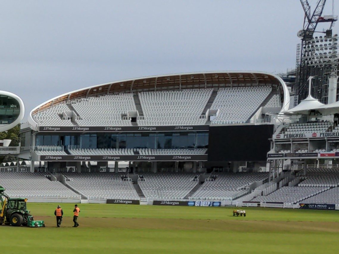 The Edrich Stand’s three tiers and curving roof at Lord’s, with end-of-season maintenance taking place on the field in October 2021